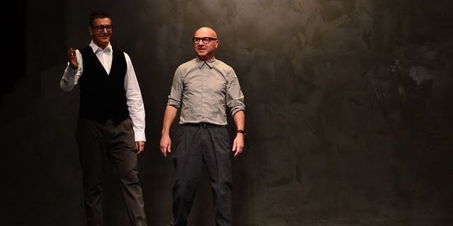 Italian designers Stefano Gabbana (L) and Domenico Dolce appear at women's fashion week in Milan on February 24, 2013. An Italian court has sentenced fashion house duo Dolce & Gabbana to one year and eight months in prison for tax evasion of around one billion euros ($1.33 billion), according to media reports.