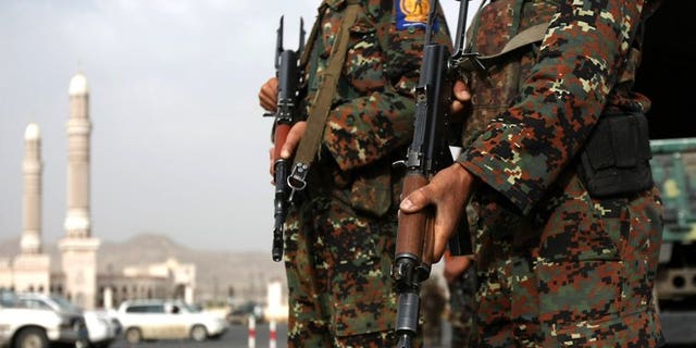 Yemeni soldiers stand guard on August 5, 2012, in Sanaa. Yemeni tribesmen have kidnapped 11 soldiers, including two officers, and are demanding the release of a relative convicted of murder, tribal sources said on Wednesday.