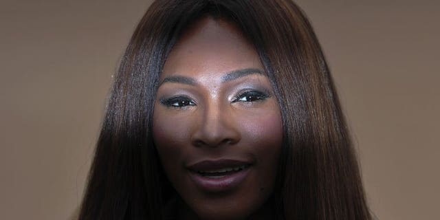 US tennis player Serena Williams poses for photographers as she arrives to attend the Burberry men's fashion show in London on June 18, 2013. Maria Sharapova has blasted Williams for the American's controversial comments over a high-profile rape case and even criticised the Wimbledon champion's private life.