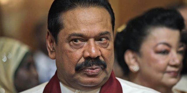 Sri Lankan President Mahinda Rajapaksa attends a reception in London, on June 6, 2012. Rajapakse has scrapped a contentious code of conduct for journalists after editors and rights groups condemned it as a further blow to press freedom, government and media sources told AFP.