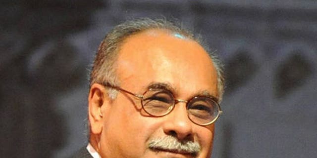Najam Sethi at an event in Hyderabad, India, in 2009. Pakistan's interim cricket chief said Monday he would ask the sport's governing body to reduce a five-year ban against promising fast bowler Mohammad Aamer for spot fixing.