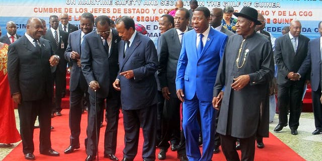 (From L) The presidents of Gabon Ali Bongo Ondimba , Togo Faure Gnassingbe, Chad Idriss Deby Itno, Cameroon Paul Biya, Congo Denis Sassou Nguesso, Burkina Faso Blaise Compaore, Benin Thomas Yayi Boni and Nigeria Goodluck Jonathan prepare for a group picture in Yaounde at a meeting of West and Central African leaders on maritime security in the Gulf of Guinea, on June 24, 2013.