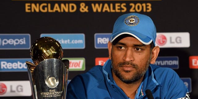 Indian captain Mahendra Sing Dhoni listens to questions during a press conference at Edgbaston in Birmingham, England on June 22, 2013. Winners India provided five players in the Champions Trophy team of the tournament announced by the International Cricket Council (ICC) on Monday.