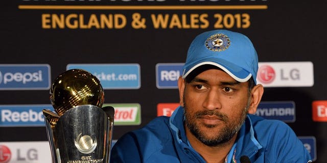 Indian captain Mahendra Sing Dhoni listens to questions during a press conference at Edgbaston in Birmingham, England on June 22, 2013. Winners India provided five players in the Champions Trophy team of the tournament announced by the International Cricket Council (ICC) on Monday.
