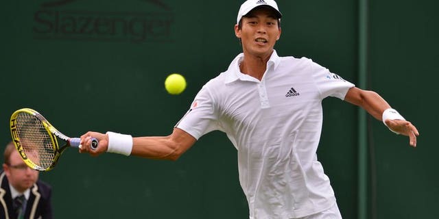 Taiwan's Lu Yen-Hsun hits a return on day one of the 2013 Wimbledon Championships at the All England Club in London, on June 24, 2013. Lu hopes to draw inspiration from his 2008 Olympics victory over Andy Murray when he clashes with the world number two for a place in the Wimbledon third round on Wednesday.