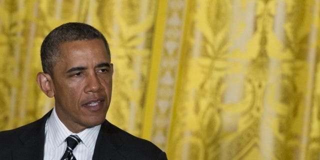 US President Barack Obama speaks during a LGBT Pride Month celebration in the East Room of the White House in Washington, DC, June 13, 2013. Obama is unlikely to see critically ill Nelson Mandela when he visits South Africa later this week, the country's minister of international relations said Tuesday.