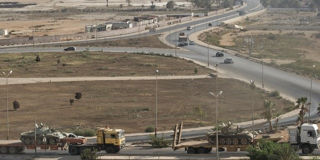 Russian-made tanks are transported towards the Giulian Harbour in Benghazi on August 25, 2011, during Libya's Arab Spring. Libya has become a major transit hub for terrorists, an African Union leader warned on Tuesday on the sidelines of a regional security meeting in neighbouring Algeria.