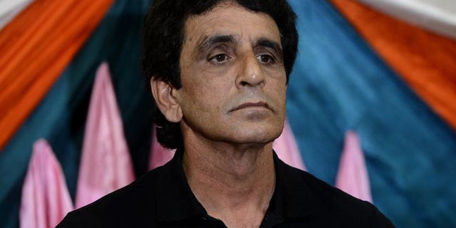 Pakistani umpire Asad Rauf speaks during a press conference in Lahore on May 29, 2013. Rauf and Billy Bowden have both been dropped from the International Cricket Council's panel of elite umpires, the global governing body announced Tuesday.
