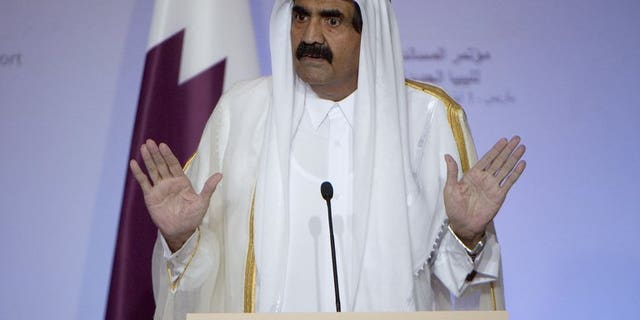 The emir of Qatar, Sheikh Hamad bin Khalifa al-Thani, speaks during a press conference on September 1, 2011. The succession of power in Qatar is not expected to disrupt the tiny Gulf state's rising international political influence or its role as an economic powerhouse with a global reach, analysts say.