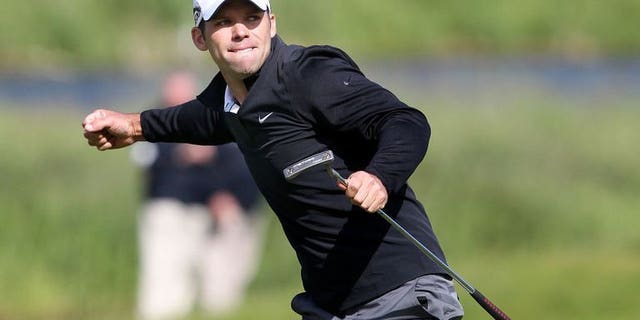 England's Paul Casey celebrates after putting for an eagle on the 18th green during the final round of the Irish Open at Carton House Golf Club, Maynooth, Ireland on June 30, 2013. Casey sensationally eagled the last hole to end a two-year victory drought and capture the Irish Open at Carton House, Maynooth, on Sunday.