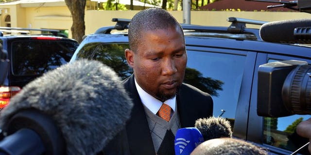 Mandla Mandela addresses the media in Johannesburg on June 12, 2013. A bitter feud within Nelson Mandela's family over the final resting place of the ailing anti-apartheid hero and his children intensified Sunday, with his grandson Mandla lamenting the dispute has been taken to court.