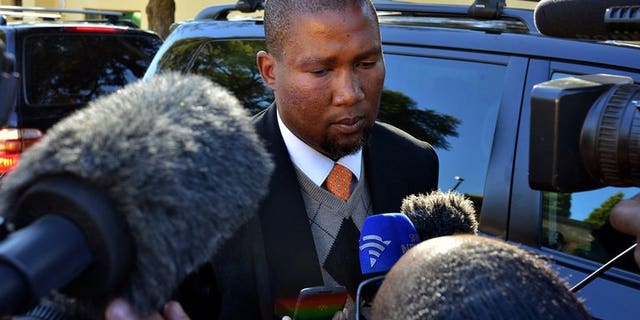 Mandla Mandela addresses the media in Johannesburg on June 12, 2013. A bitter feud within Nelson Mandela's family over the final resting place of the ailing anti-apartheid hero and his children intensified Sunday, with his grandson Mandla lamenting the dispute has been taken to court.