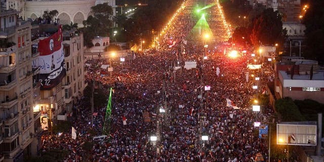 Hundreds of thousands of Egyptian demonstrators gather outside the presidential palace in Cairo during a protest calling for the ouster of President Mohamed Morsi on June 30, 2013. "Millions" of protesters took to the streets of Egypt on Sunday to demand the resignation of Islamist President Mohamed Morsi, a military source said, citing army estimates.