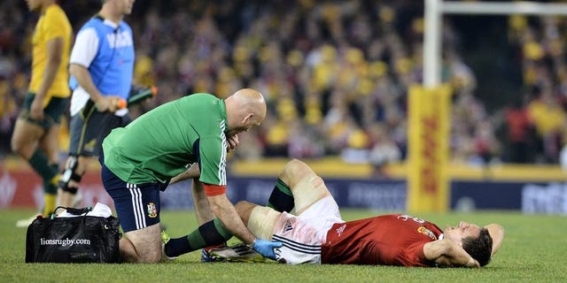 Lions captain Sam Warburton lies injured during the second Test against Australia on June 29, 2013. Warburton has been ruled out of Saturday's deciding Test in a massive blow for the tourists.