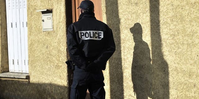 A French policeman patrols the streets of Decines-Charpieu, on April 11, 2012. Robbers posing as policemen made off with 200,000 euros ($261,000) belonging to a senior official from the Saudi youth and sports ministry just after he landed in Paris, police said Monday.
