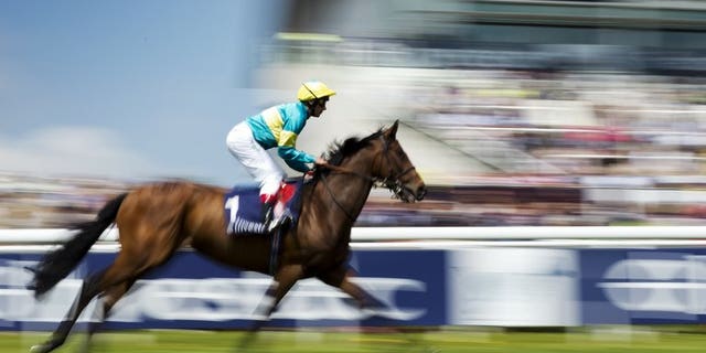 Frankie Dettori rides Fattsota at Epsom on May 31. Dettori on Monday signed a contract to ride for emerging Qatari owner Sheikh Joaan al-Thani, the Racing Post newspaper reported.