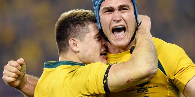 Australian captain James Horwill (R) and flyhalf James O'Connor celebrate victory over the British and Irish Lions on June 29, 2013 in the second Test. Horwill was cleared of stamping on Lions player Alun Wyn Jones in the first Test, meaning he can play in this weekend's series decider.