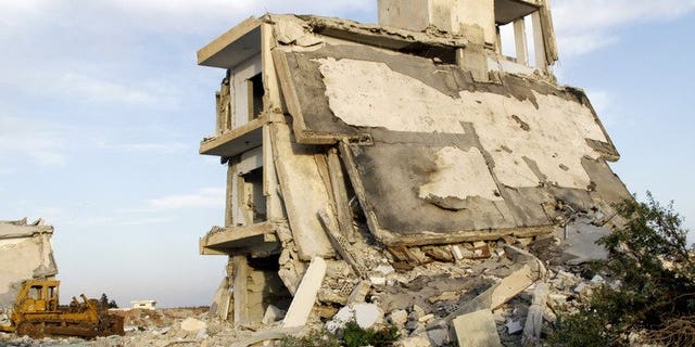 Destroyed buildings in the village of al-Hamidiyeh, in central Homs province, on June 7, 2013. UN leader Ban Ki-moon has expressed fear for 2,500 "trapped" civilians as Syrian government forces press a campaign to take the city of Homs, a spokesman said.
