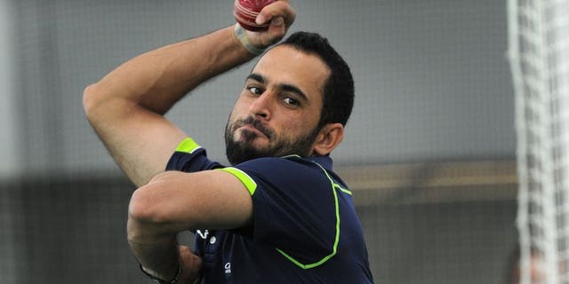 Legspinner Fawad Ahmed bowls at the indoor cricket nets at the MCG in Melbourne on June 6, 2013. England great Graham Gooch expressed surprise Tuesday that Australia were prepared to pick Ahmed