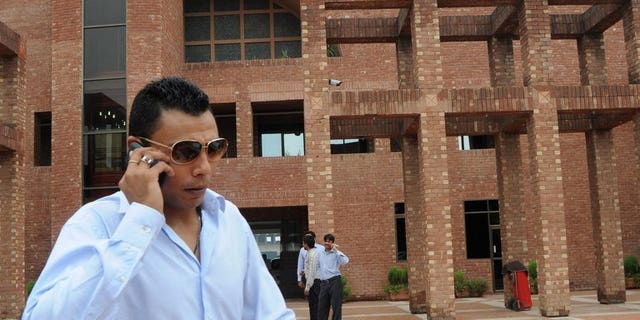 Danish Kaneria leaves the Gaddafi stadium in Lahore on August 15, 2011. Kaneria was urged to "come clean" after his lifetime ban from cricket remained in place Tuesday when the England and Wales Cricket Board rejected his appeal at a hearing in London.