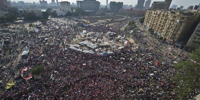 Opponents of Egyptian President Mohamed Morsi protest in Cairo's landmark Tahrir Square, on July 2, 2013. Close to 100 women have fallen victim to "rampant" sexual attacks in Cairo's Tahrir Square during four days of protests against Egypt's Islamist President Mohamed Morsi, Human Rights Watch said on Wednesday.