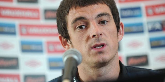 Everton defender Leighton Baines speaks during a press conference with the England squad in Hertfordshire, on September 4, 2012. New Everton manager Roberto Martinez illustrated his determination to fend off Manchester United's interest in Baines by describing the England international as "an icon".