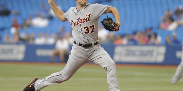 Max Scherzer of the Detroit Tigers pitches during the game against the Toronto Blue Jays on July 3, 2013. He pitched 6 1/3 strong innings in a 6-2 victory over Toronto to become the first MLB hurler since 1986 to open a season 13-0.