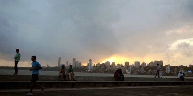 The sun sets over of Mumbai on September 7, 2012. A two-storey building housing apartments and garment makers has collapsed near Mumbai, killing one person, police said Thursday -- the fifth deadly collapse around the Indian financial capital in the past few months.