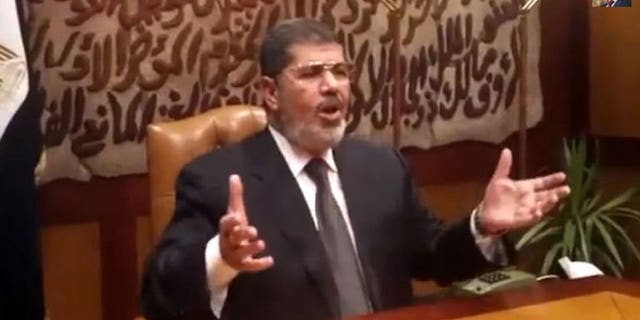 An image taken from a video released by the Muslim Brotherhood Office shows ousted president Mohamed Morsi speaking at an undisclosed location in Egypt, on July 3, 2013. Egypt's chief justice Adly Mansour has been sworn in as the country's interim president, a day after the military ousted and detained Morsi following a week of massive protests.