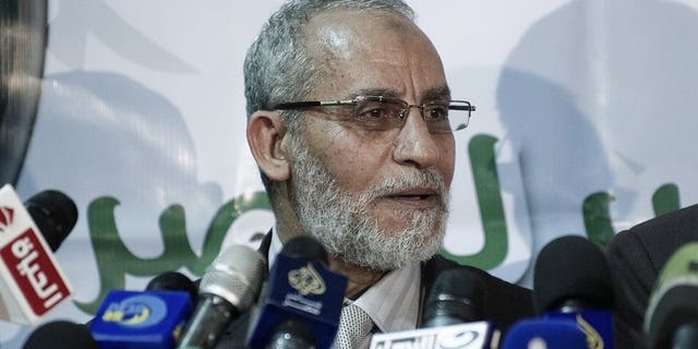 Egypt's Muslim Brotherhood leader Mohamed Badie speaks during a press conference in Cairo, on March 31, 2012. Egyptian authorities have issued an arrest warrant for Badie and his first deputy Khairat El-Shater, a judicial source tells AFP.