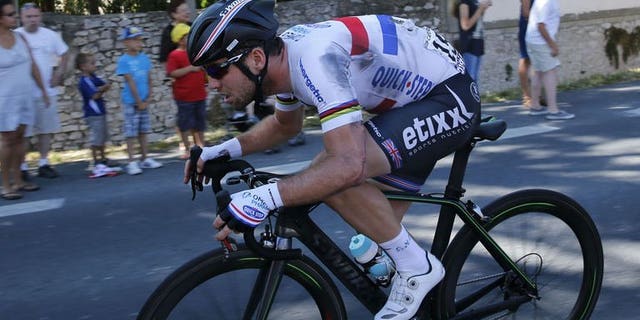 Britain's Mark Cavendish rides after a fall during the 176.5 km sixth stage of the Tour de France on July 4, 2013 between Aix-en-Provence and Montpellier, southern France. The British champion was fourth in the sprint for the line at the end of the 176-kilometre ride.