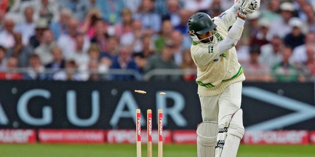 Danish Kaneria loses his wicket to England's Stuart Broad at Trent Bridge in July 2010. Pakistan on Friday endorsed England's decision to uphold the life ban on Danish Kaneria, calling on the leg-spinner to reflect on his conduct and start a process of rehabilitation.