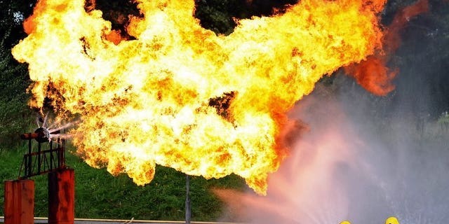 Fire-fighters extinguish a simulated gas leak during an exercise in Liverpool, England on September 7, 2010. A recent report from the industry body, Oil & Gas UK, found oil and gas leaks fell by 48 percent in three years between 2010 and 2013, just short of the 50 percent target.
