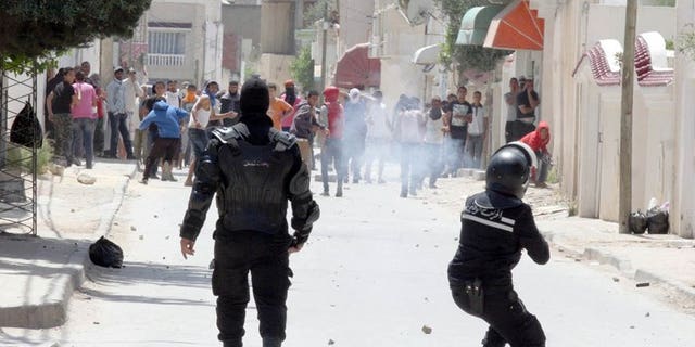 Police clash with radical Islamists on May 19 in Ettadhamen, a poor neighbourhood west of Tunis. The public prosecutor is due to question 19 actors who were attacked by radical Salafist Muslims for alleged "indecent" behaviour, their lawyer told AFP on Sunday.