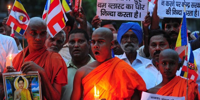 A peace vigil is held in Allahabad on July 7, 2013, following a series of blasts at the Bodh Gaya temple. No one has claimed responsibility for the attack, but police arrested a local man who was being questioned in connection with the blasts.