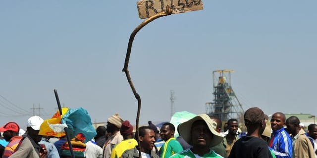 A sign in Rustenburg last September reads 12,500 rand, the wage sought by Amplats miners. Moody's rating agency on Monday warned South African banks and other lenders which issue loans without collateral face a bumpy time ahead as the economy wobbles and labour unrest continues.