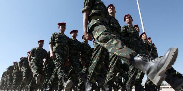 Soldiers of the Republican Guard march during the graduation ceremony for the first batch of a Personal Protection Battalion in the Yemeni capital Sanaa, on December 23, 2012. Gunmen shot dead a high-ranking Yemeni army officer Monday in the country's southeastern Hadramawt province as he was heading to work, a military official told AFP.