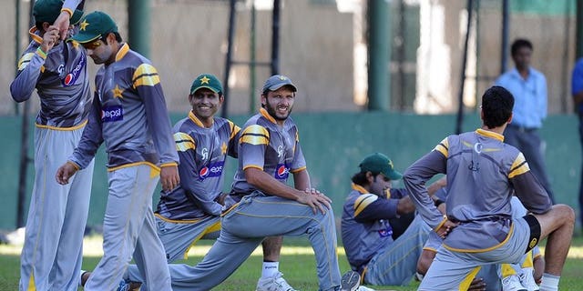 Pakistan cricketers stretch during an ICC Twenty20 Cricket World Cup practise session in Colombo on October 3, 2012. Pakistan announced the schedule for its series against South Africa in October, involving two Tests, five one-day matches and two Twenty20 games.