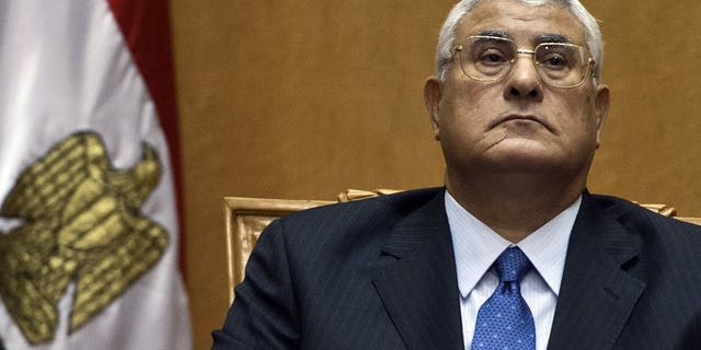 Egypt's chief justice Adly Mansour is sworn in as interim president in Cairo on July 4, 2013, a day after the military ousted and detained president Mohamed Morsi following days of massive protests. Mansour's interim charter hit a wave of opposition shortly after it was announced late on Monday, illustrating the treacherous political landscape following Morsi's ouster.