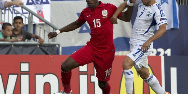 Wilfried Zaha (left) plays for England Under-21s against England in Jerusalem on June 11. David Moyes says new signing Zaha will join Manchester United's squad for their pre-season tour of east Asia and Australia.
