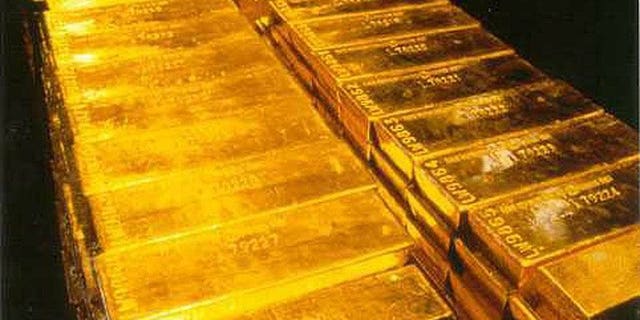 Gold bullion is stored inside a high-security vault in London, on September 28, 1999. Nepal police have seized 35 kilograms (77 pounds) of gold, smuggled over the border from China and bound for India, where demand for the precious metal is soaring.