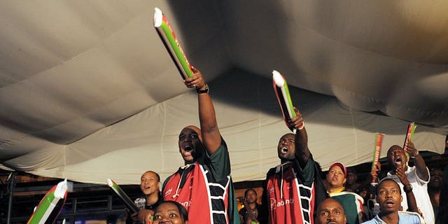 Kenyan rugby fans watch a match on May 23, 2009 in Nairobi. Kenya and Zimbabwe moved a step closer Wednesday to playing at the 2015 Rugby World Cup in England.