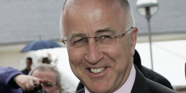 Britain's then-Europe minister Denis MacShane arrives at a foreign ministers' meeting in Luxembourg on April 15, 2005. MacShane is to be charged with false accounting over his expenses claims in parliament, prosecutors said Thursday.