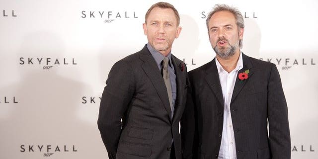 British actor Daniel Craig (L) poses with British director Sam Mendes in central London on November 3, 2011. The next James Bond film will be released in late 2015, producers announced Thursday, with Craig reprising his role as the suave British spy and Mendes returning as director after dramatically reversing his decision to quit.