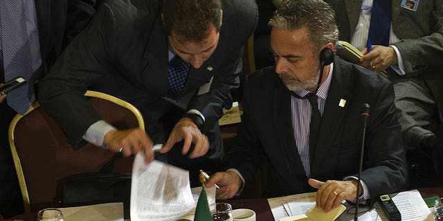 Brazil's Foreign Minister Antonio Patritota listens to an assistant during a Mercosur meeting in Montevideo on July 11, 2013. Leaders of the South American trade bloc that includes Brazil and Venezuela meet Friday for a summit that will focus on allegations of US spying that have outraged US allies and rivals alike.