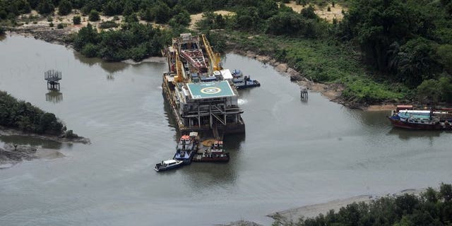 An aerial view of the Shell Awobo flow station in the Niger Delta taken on March 22, 2013. Shell has shut a major pipeline in Nigeria for the second time in less than a month after locating another leak on the line repeatedly hit by oil thieves, the company said on Friday.
