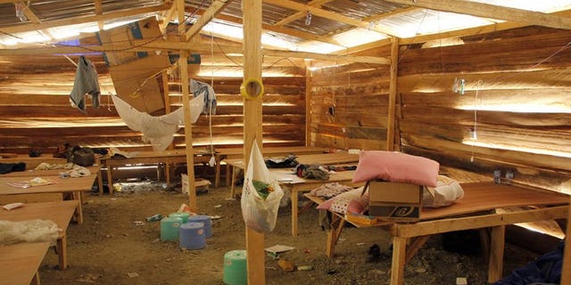 A photo taken on June 15, 2013 shows living quarters for Chinese miners at a mine that was raided by Ghana's security forces in Dunkwa-on-Offin in the center of Ghana. More than 4,500 Chinese have left Ghana since a crackdown on illegal mining began in June, with the illicit industry having drawn scores of Chinese to the west African nation, an official said Friday.