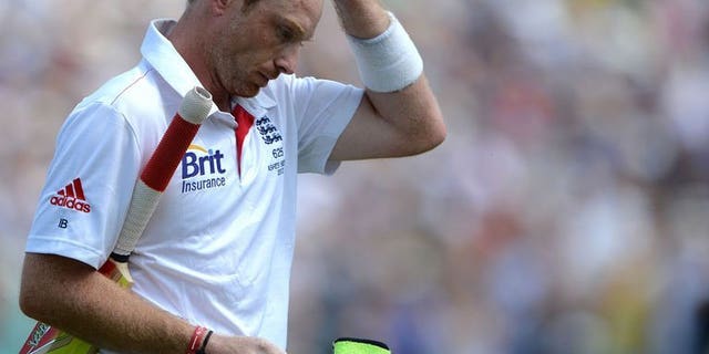 England's Ian Bell leaves the field after losing his wicket for 109 runs on the fourth day of the first Ashes cricket Test against Australia in Nottingham on July 13, 2013.