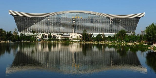 This picture taken on May 26, 2013 shows the "New Century Global Centre" building in Chengdu, in southwest China's Sichuan province. Boasting its own artificial sun and a floor area three times that of the Pentagon, the "world's largest building" has opened in southwest China to mixed reviews from its first visitors.