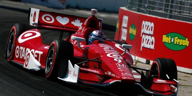 Scott Dixon of New Zealand drives the Target Chip Ganassi Racing Honda during the IZOD INDYCAR Series Honda Indy Toronto Race 1 on July 13, 2013 in Toronto, Canada. Dixon held off Sebastien Bourdais to capture the first race of the weekend doubleheader in Toronto.